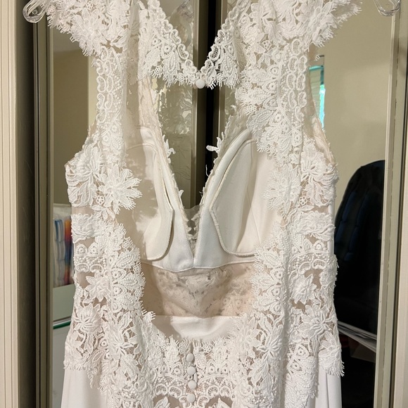 New wedding dress. Only tried on. No alterations have been done to this item. - Picture 4 of 9